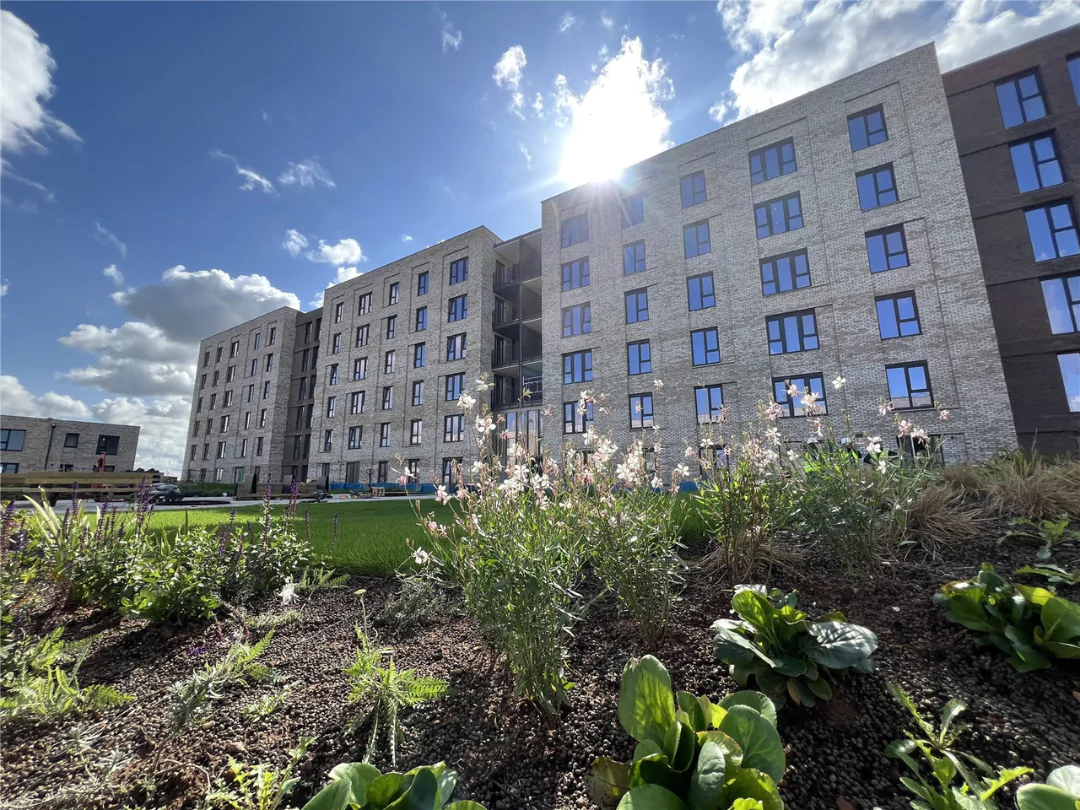 The exterior of The Dials apartment building at Brabazon on a sunny day.