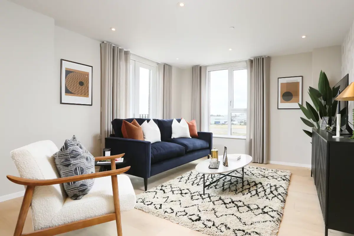 Light and airy styled living space featuring neutral decor.