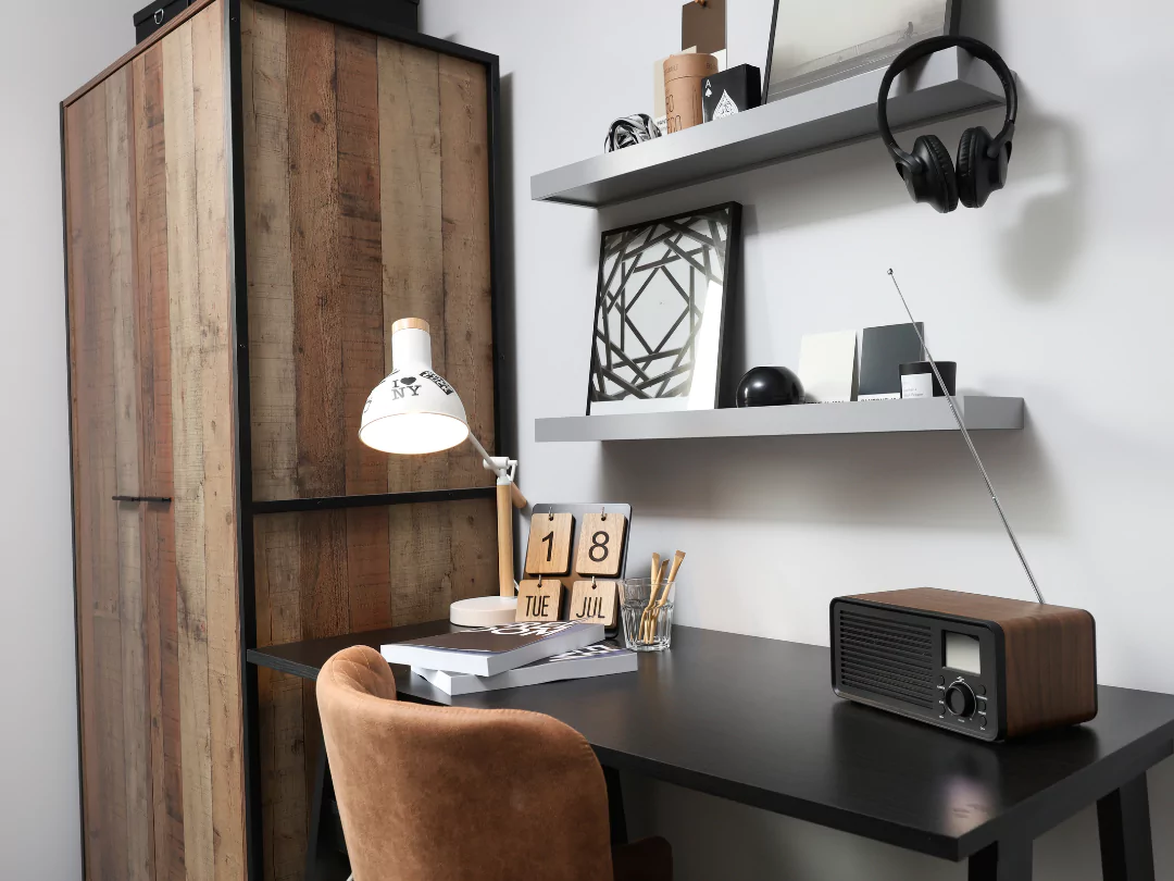 Wooden desk within the teen double bedroom, to be used as a home study.