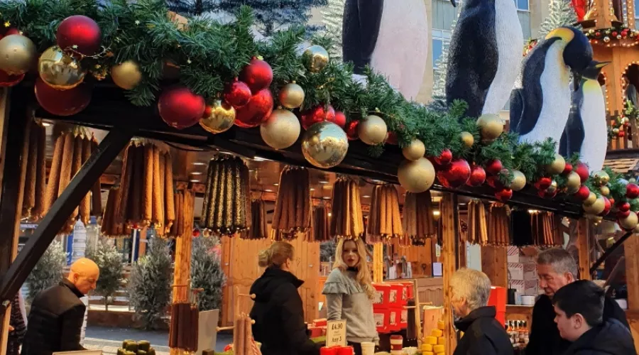 Aa night time image at Bristol Christmas Market Broadmead featuring a large lit up star.